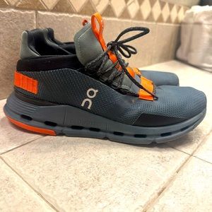 On cloud. Green and orange shoes